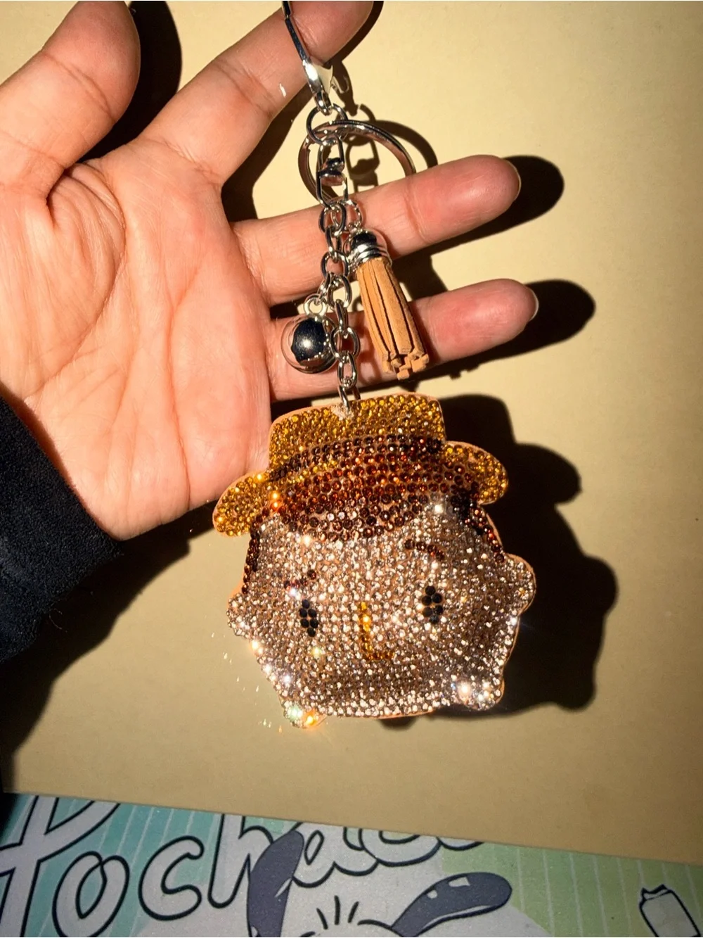 🤠NWOT Crystal Embellished Tan Keychain Charm with Tassel in Woody character